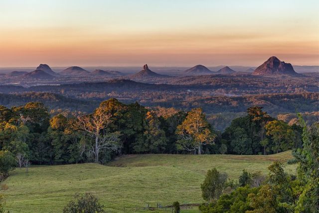 See the Glasshouse Mountains